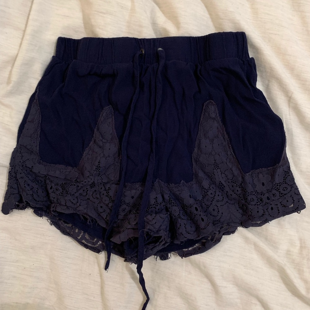 Flowy baby blue shorts with lace trim